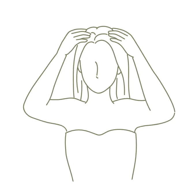 頭皮を指の腹でマッサージ